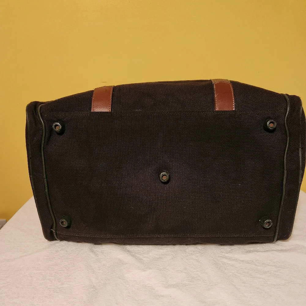 2 piece Vintage American Tourister carry on luggage.